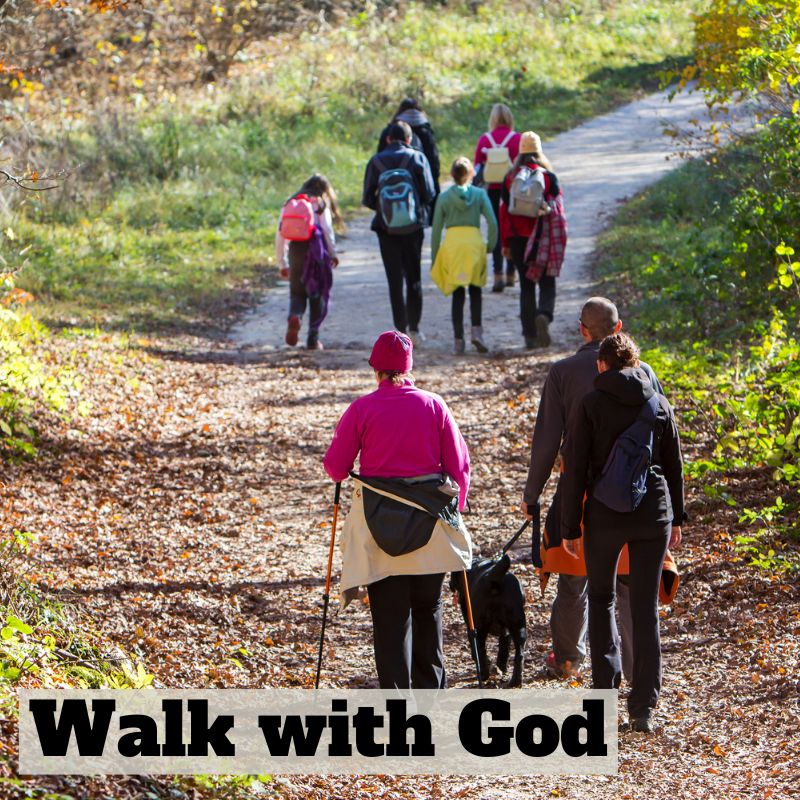 people walking on pavement through the woods with the text Walk with God church in Lynchburg, VA